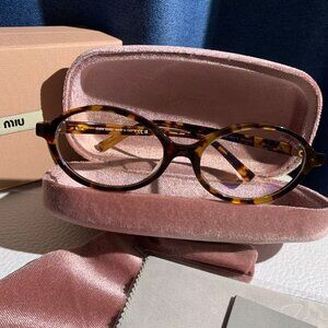 Miu Miu Black Oval Sunglasses w/ Gold Logo • Statement Luxe Vibes